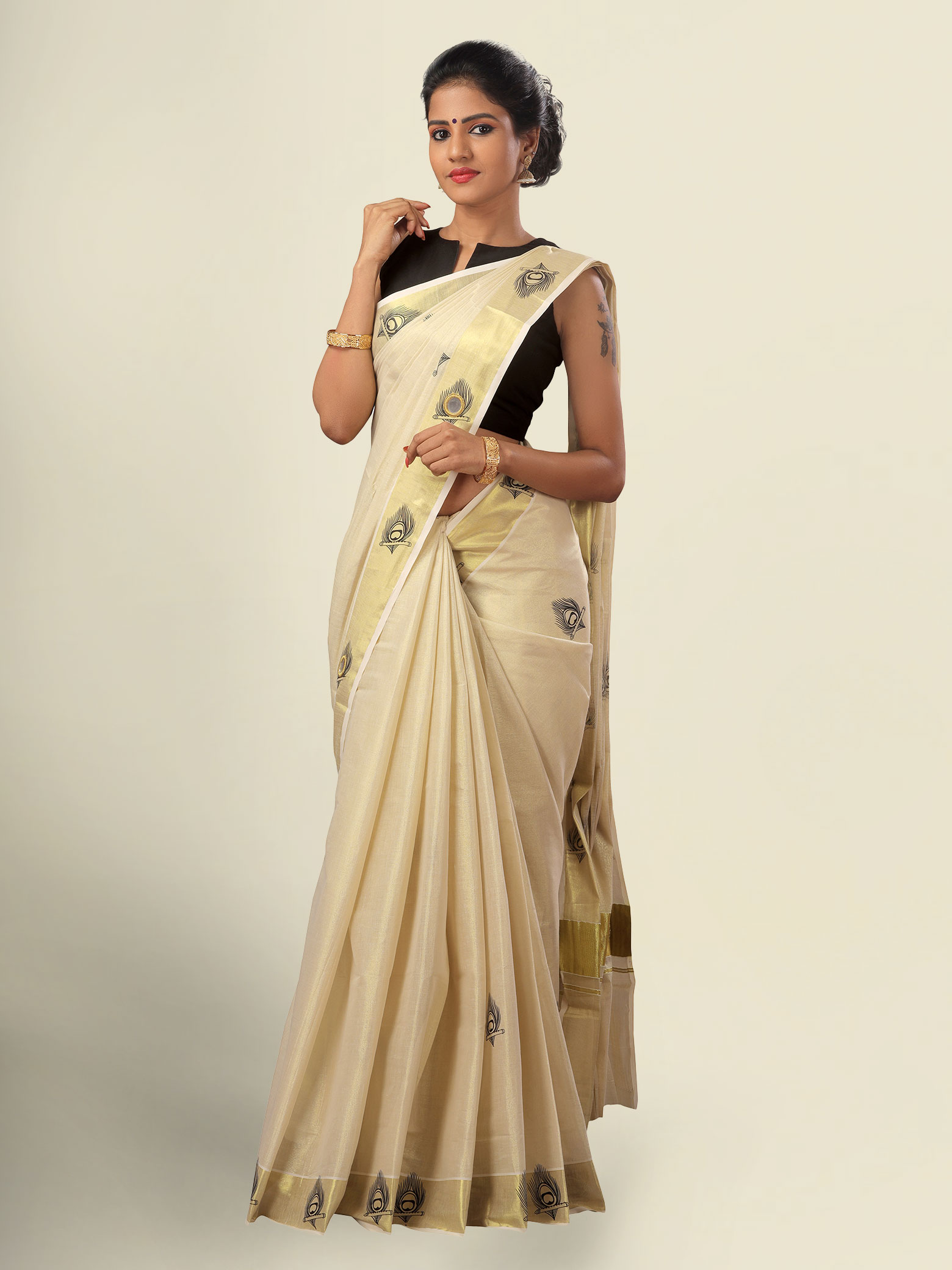 set saree with golden blouse